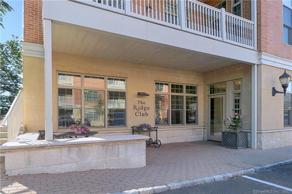 100 Stone Ridge Way, Unit 1H Fairfield, CT 06824 - Photo 14 of 30 front view of house with a outdoor space