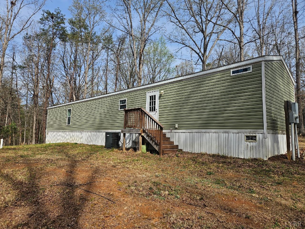 415 Plum Branch Road Lynchburg, VA 24504 - Photo 17 of 17 a view of a house with a large tree
