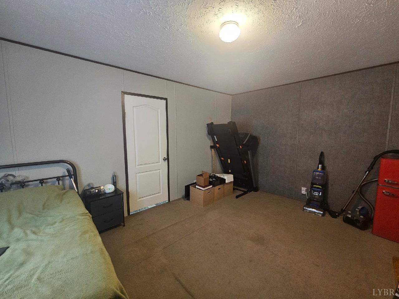 415 Plum Branch Road Lynchburg, VA 24504 - Photo 8 of 17 a view of a room with gym equipment