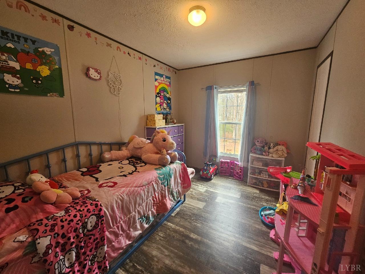 415 Plum Branch Road Lynchburg, VA 24504 - Photo 10 of 17 a bed room with a bed and a window