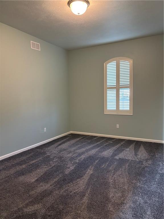 901 Valentina Lane Lower Burrell, PA 15068 - Photo 13 of 25 an empty room with a window