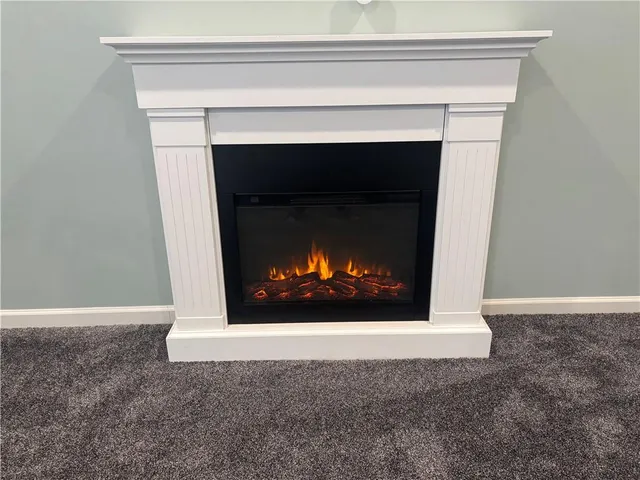 a living room with a fireplace