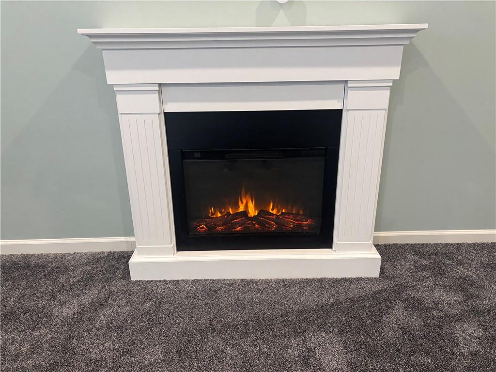 901 Valentina Lane Lower Burrell, PA 15068 - Photo 7 of 25 a living room with a fireplace