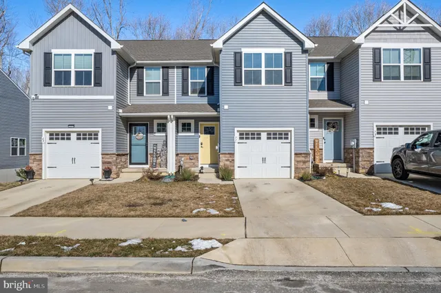 a front view of a house with a space