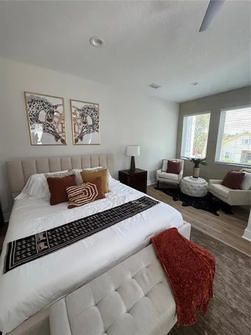 a bedroom with furniture and a couch