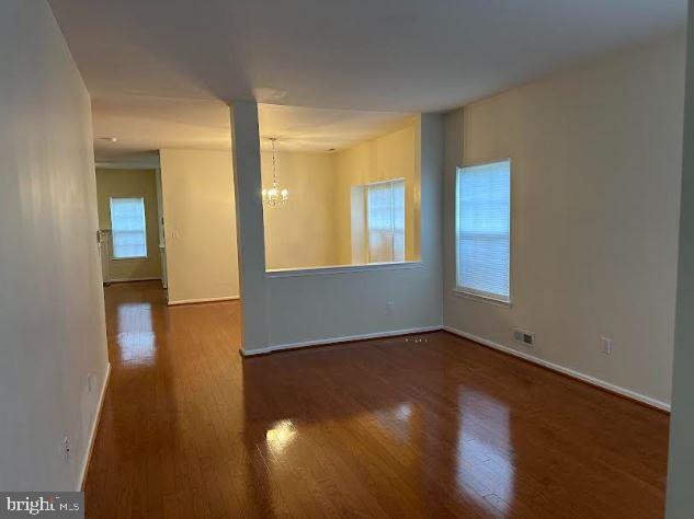 35 Versailles Boulevard Cherry Hill, NJ 08003 - Photo 2 of 16 wooden floor in an empty room with a window