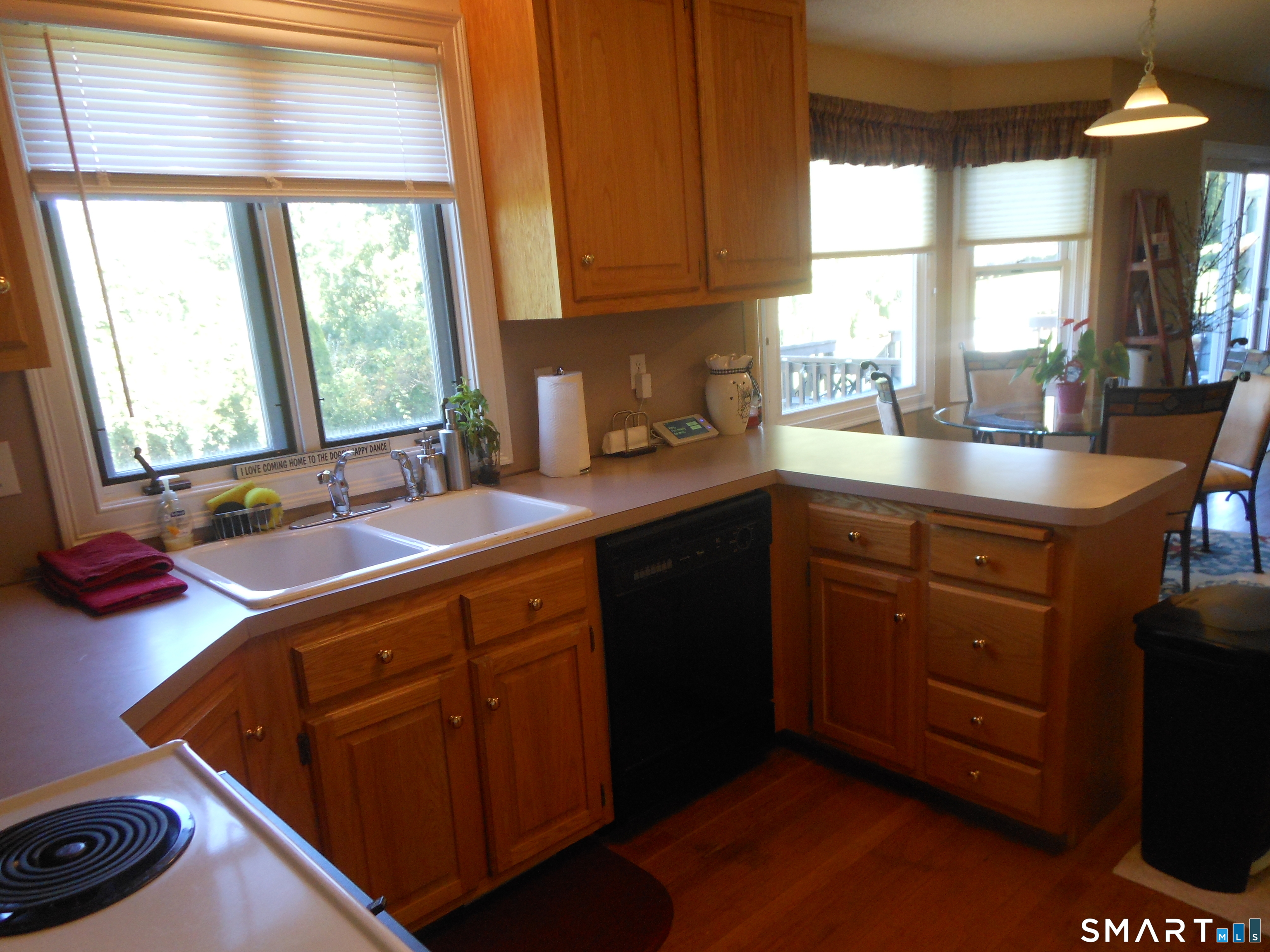 29 Skyview Terrace Manchester, CT 06040 - Photo 4 of 9 a kitchen with a sink stove and cabinets