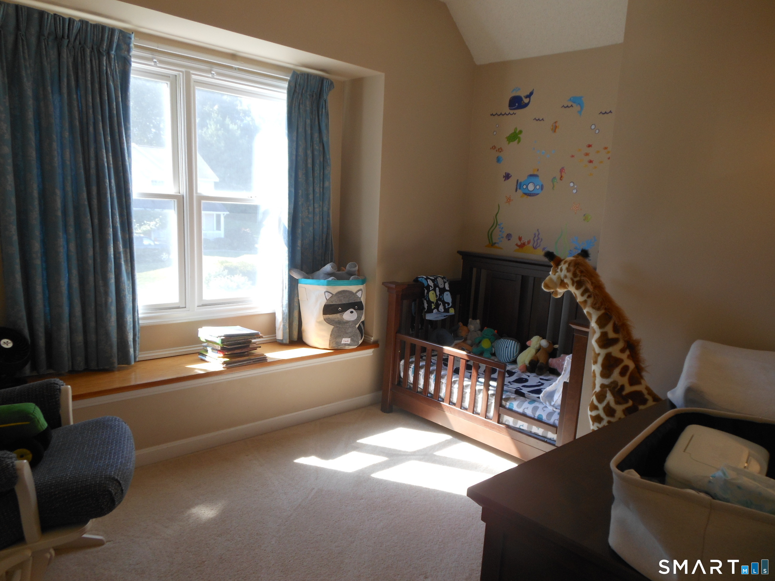 29 Skyview Terrace Manchester, CT 06040 - Photo 8 of 9 a living room with furniture and a window