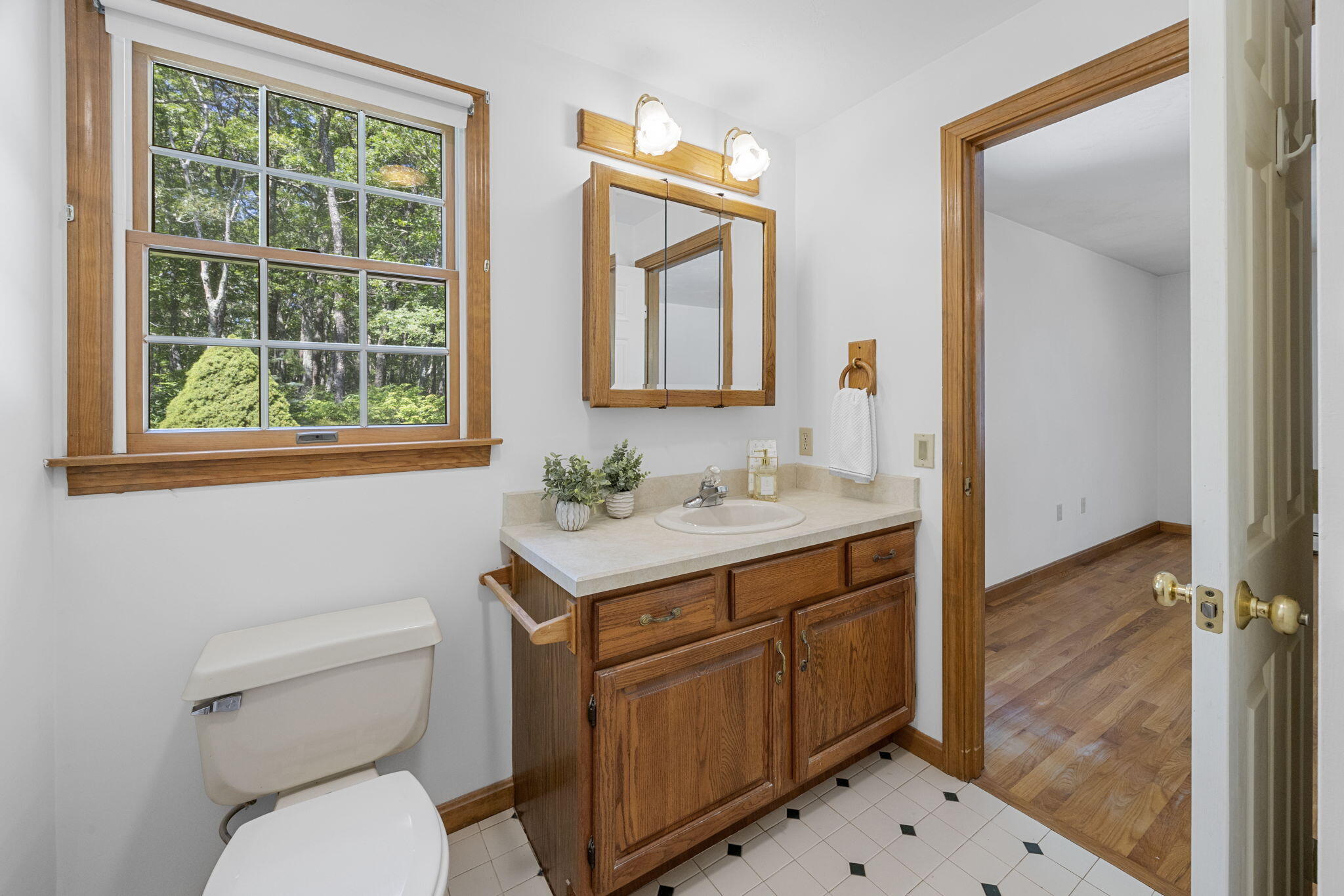 19 Fishermans Landing Road Brewster, MA 02631 - Photo 25 of 58 a bathroom with a toilet sink and mirror