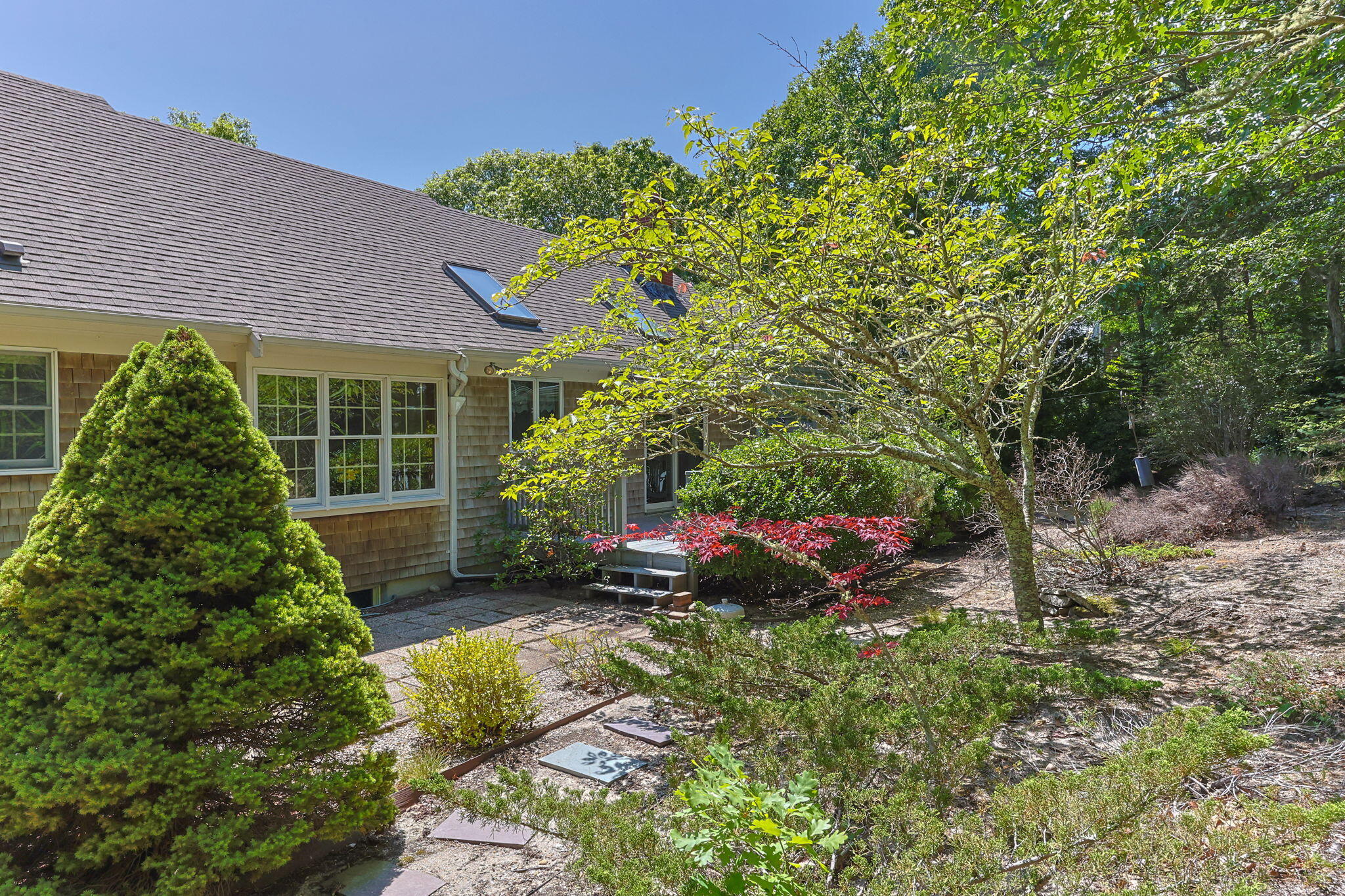 19 Fishermans Landing Road Brewster, MA 02631 - Photo 47 of 58 a view of a house with a garden