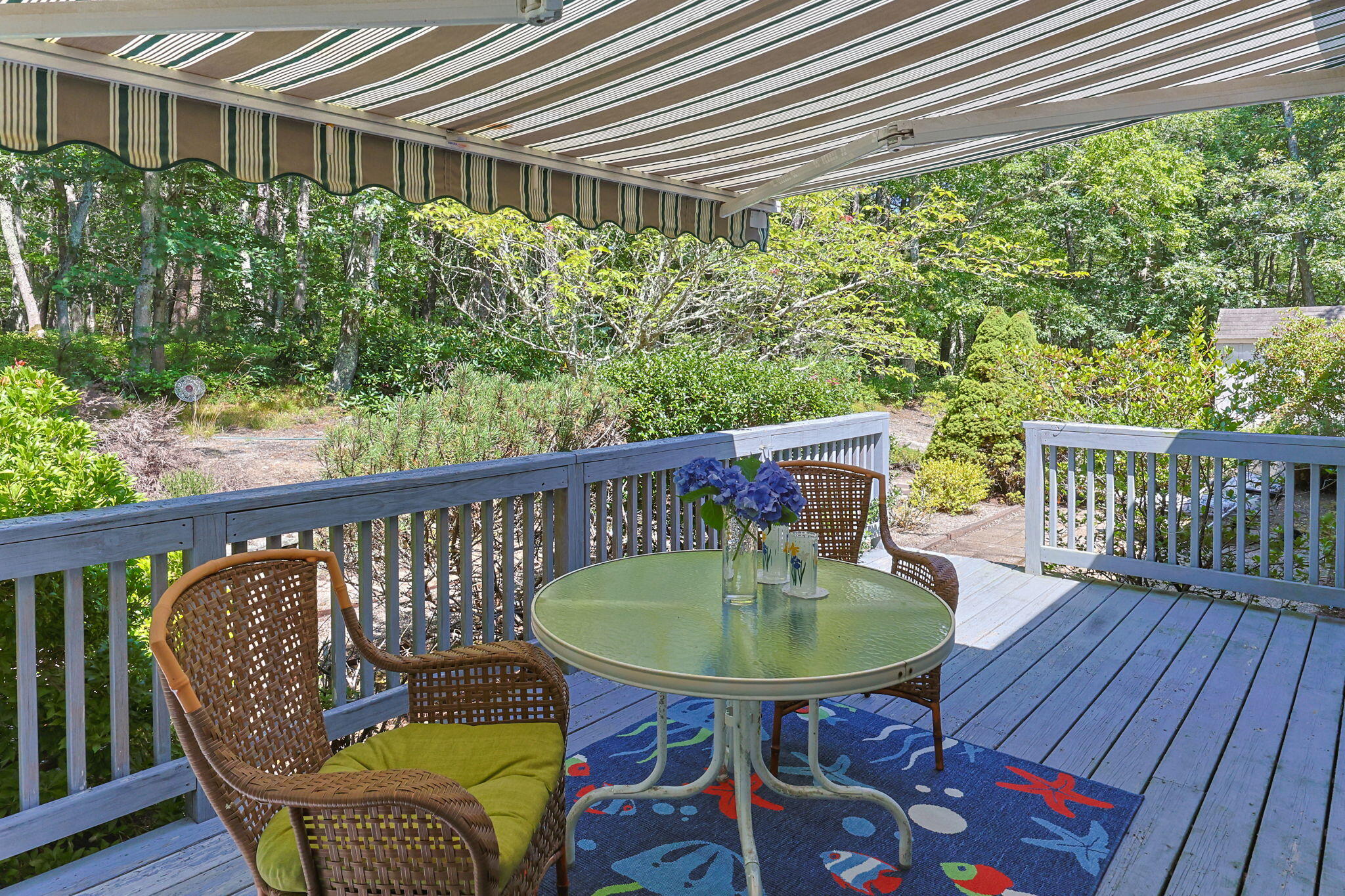 19 Fishermans Landing Road Brewster, MA 02631 - Photo 10 of 58 a balcony with wooden floor table and chairs