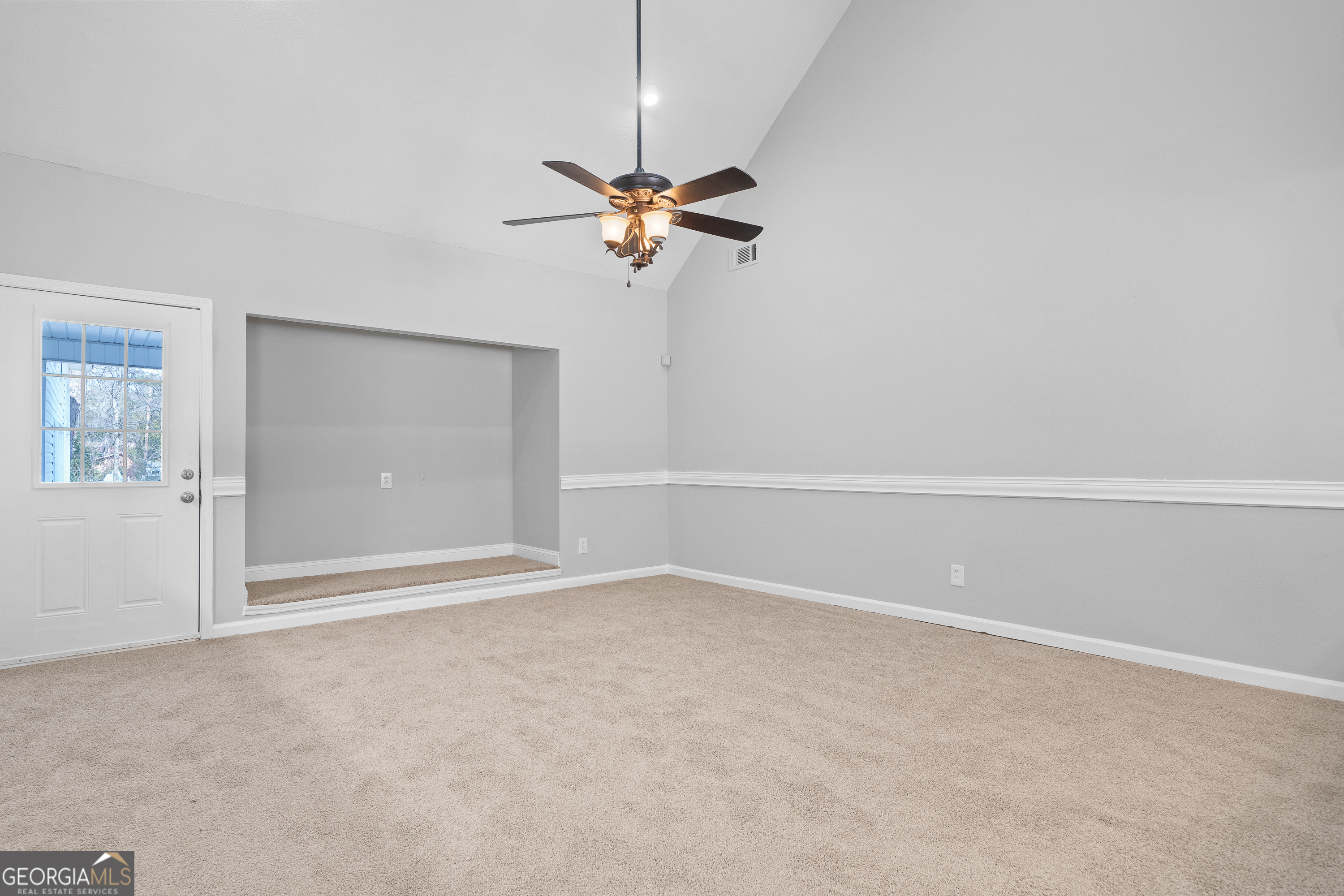 7513 Columbus Road Lizella, GA 31052 - Photo 13 of 54 a view of a room with a fan