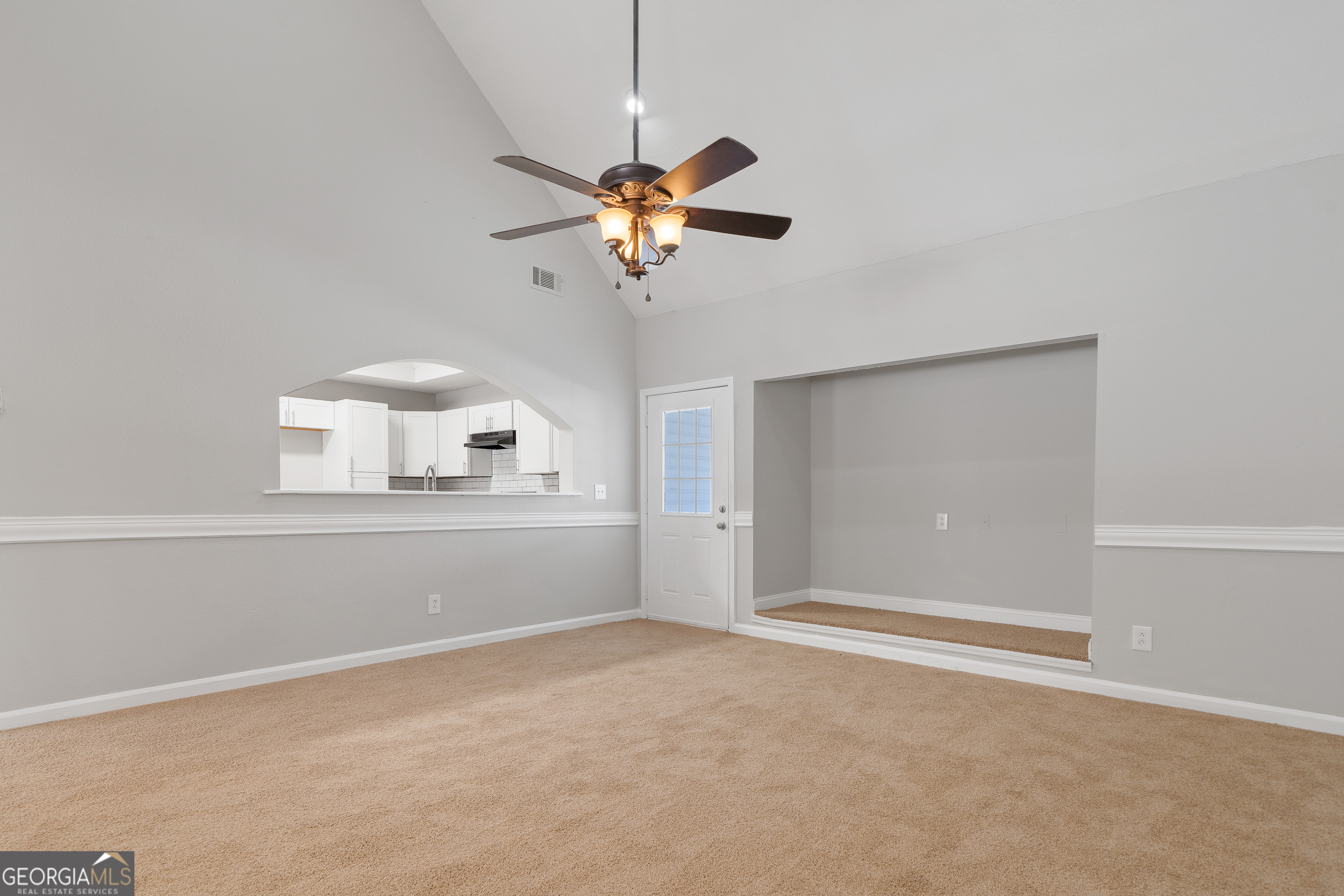 7513 Columbus Road Lizella, GA 31052 - Photo 17 of 54 a view of room with a ceiling fan and window