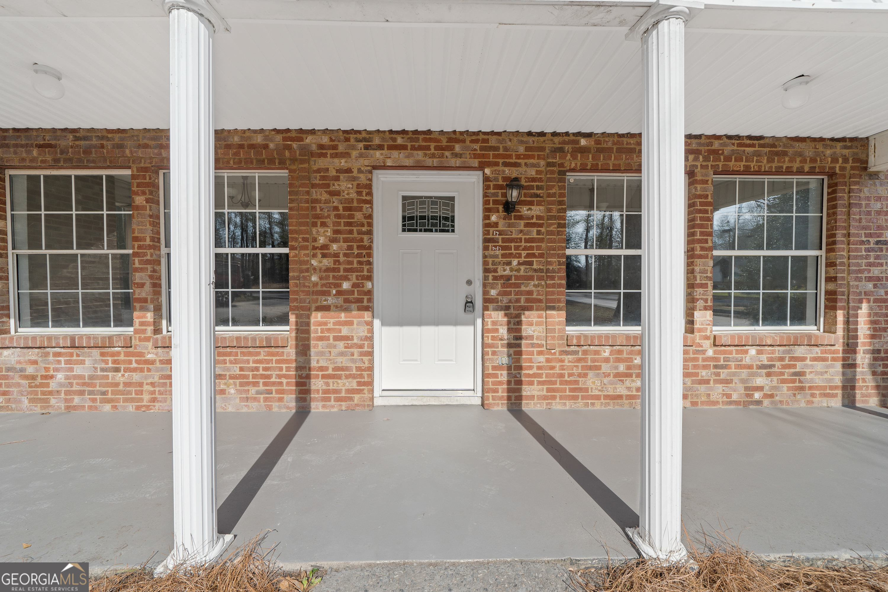 7513 Columbus Road Lizella, GA 31052 - Photo 2 of 54 a view of front door of house
