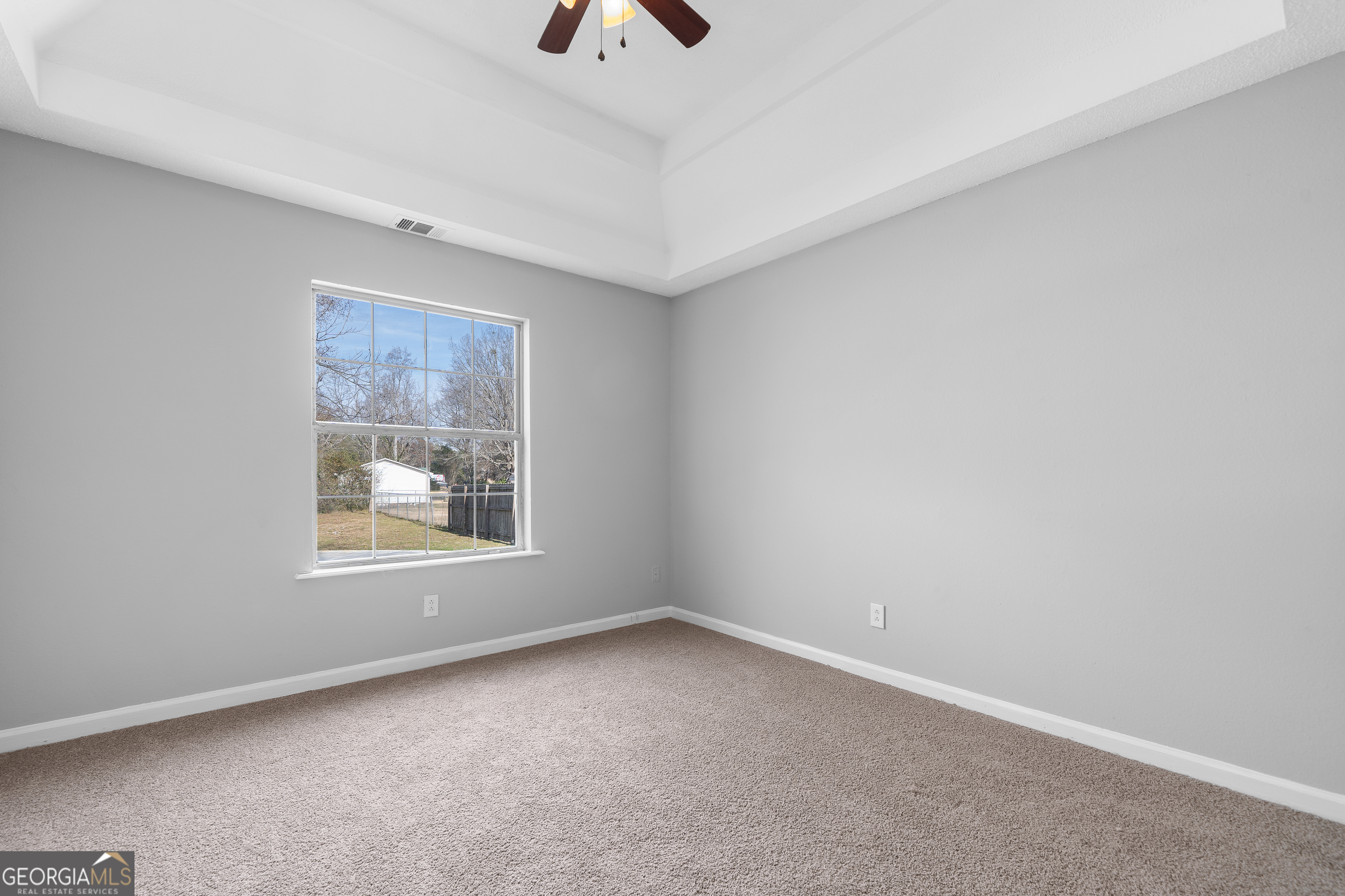 7513 Columbus Road Lizella, GA 31052 - Photo 22 of 54 an empty room with a window