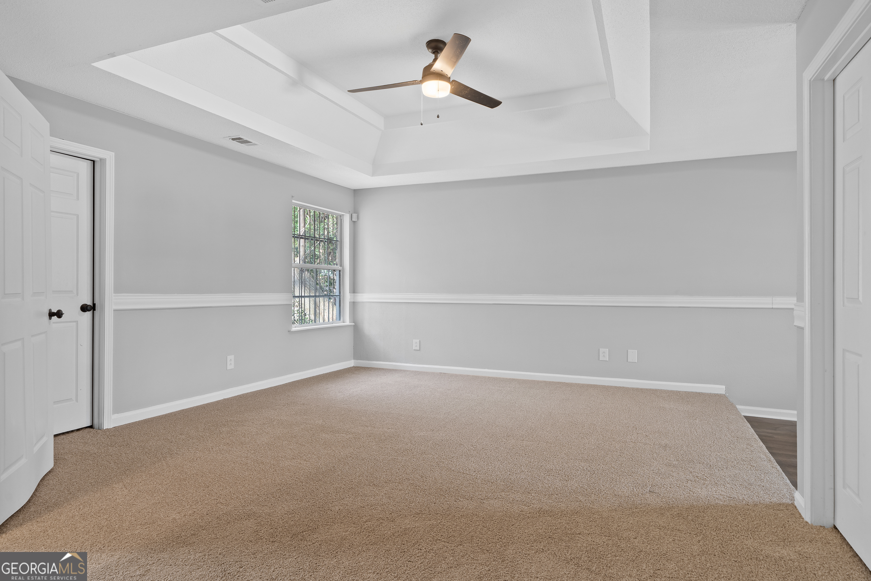 7513 Columbus Road Lizella, GA 31052 - Photo 27 of 54 a view of an empty room with a window