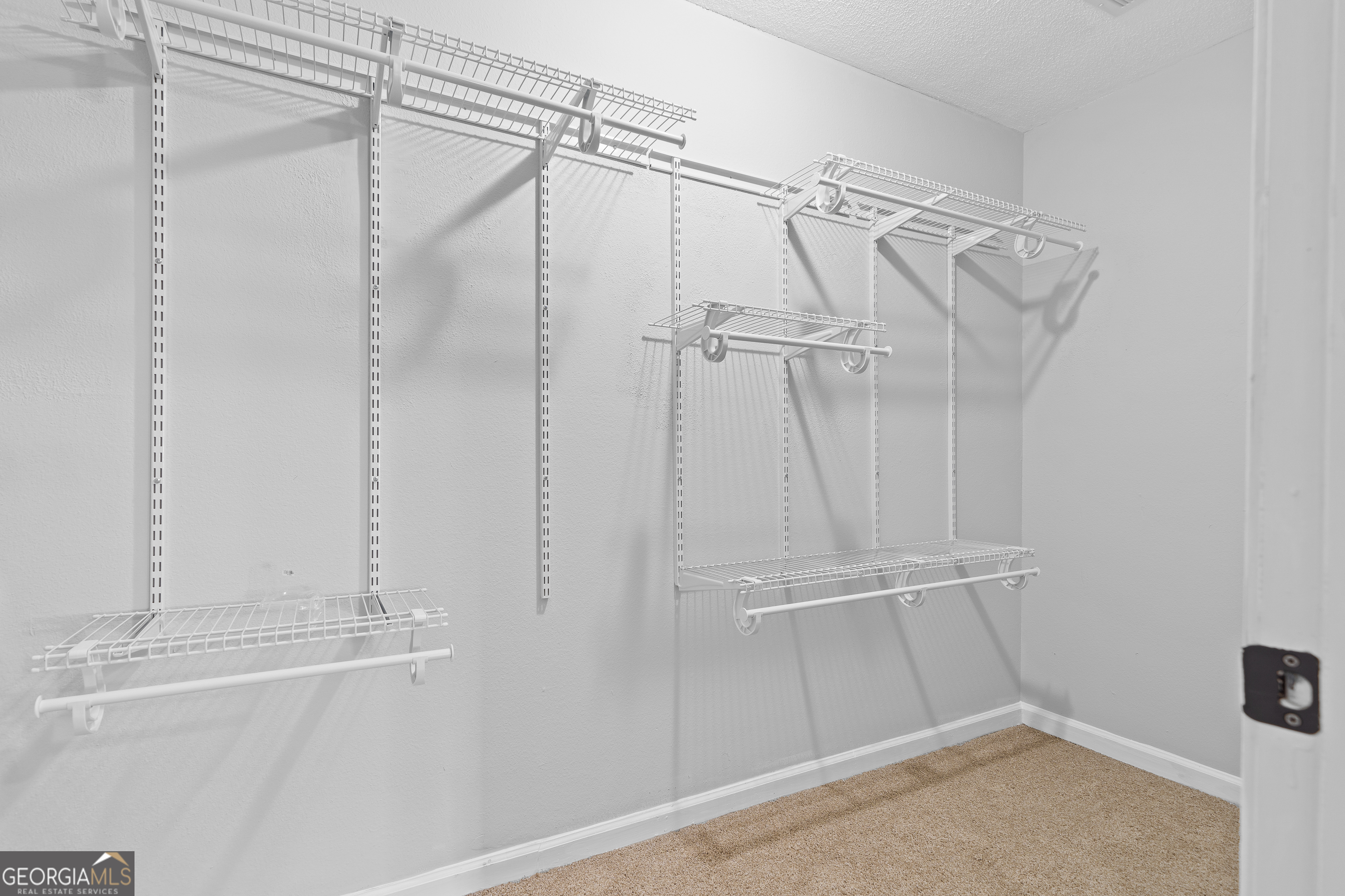 7513 Columbus Road Lizella, GA 31052 - Photo 31 of 54 a view of walk in closet