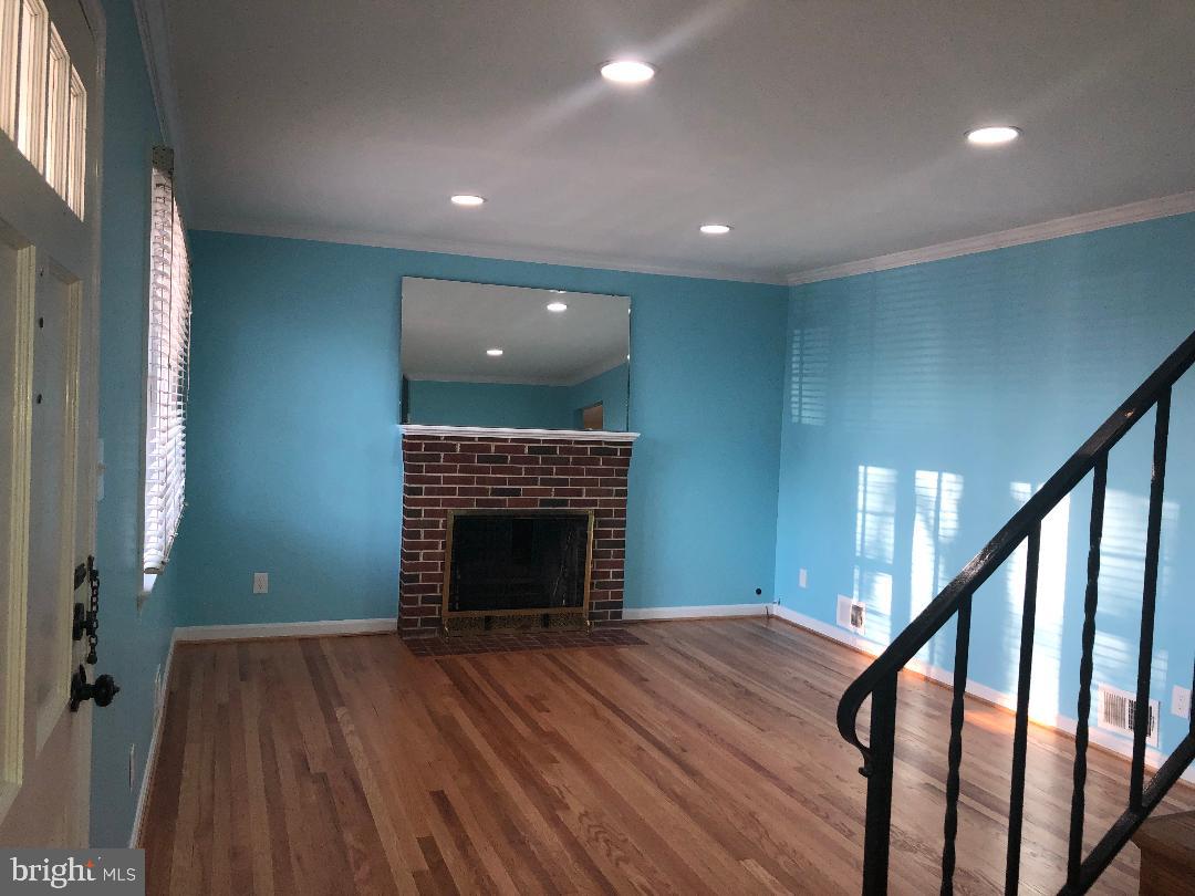 8714 Edmonston Road Berwyn Heights, MD 20740 - Photo 9 of 19 Living Room with chimney