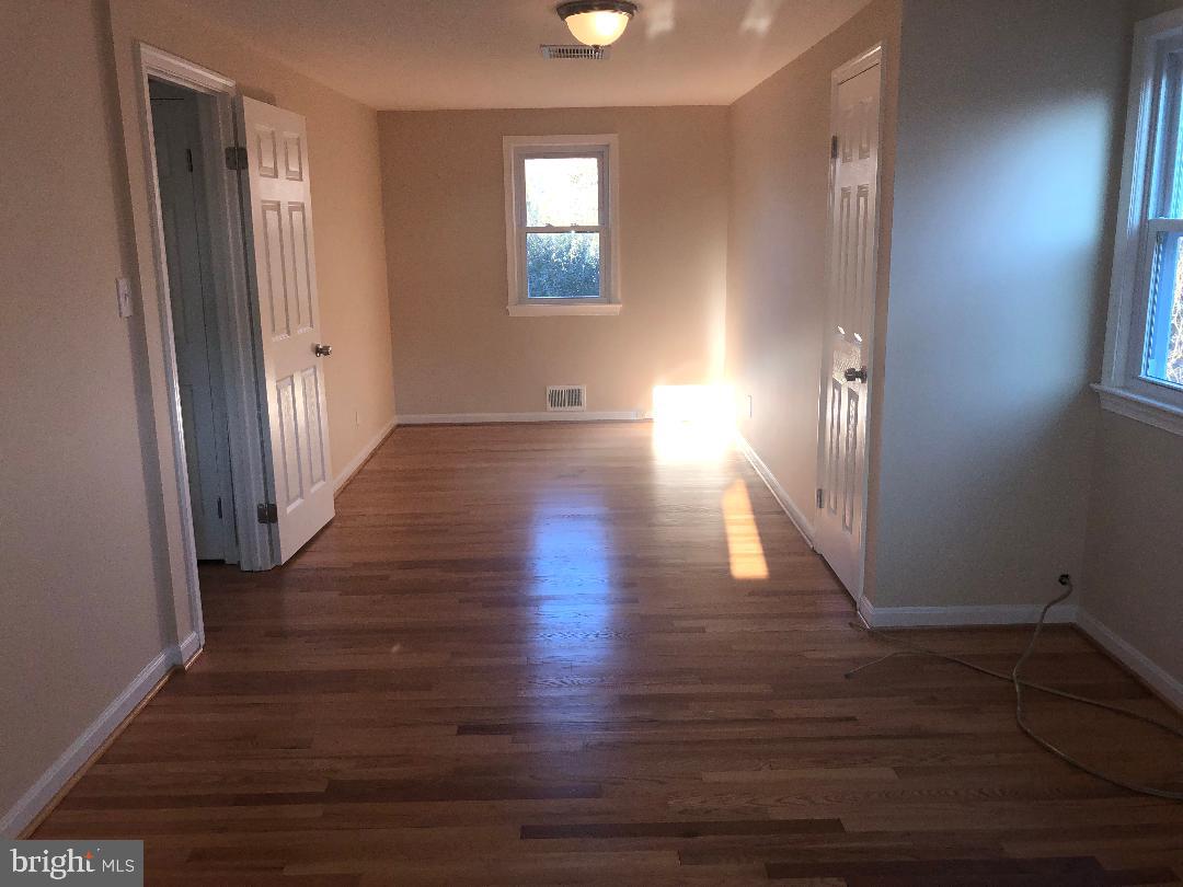 8714 Edmonston Road Berwyn Heights, MD 20740 - Photo 10 of 19 Large Bedroom at upper level