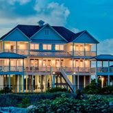 a front view of a house with yard