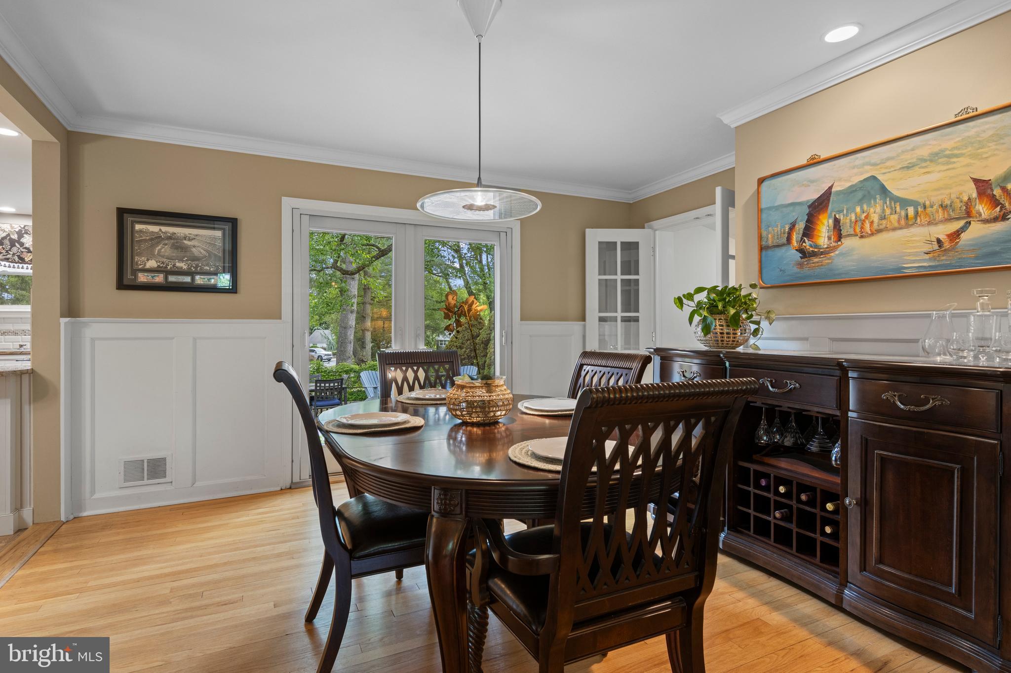 413 Hawthorne Road Wallingford, PA 19086 - Photo 12 of 52 a view of a dining room with furniture window and wooden floor