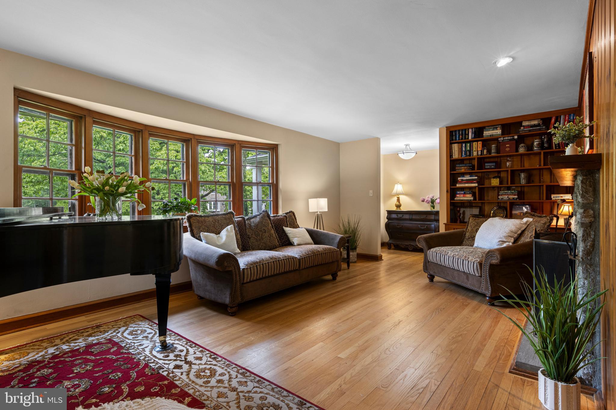 413 Hawthorne Road Wallingford, PA 19086 - Photo 14 of 52 a living room with furniture and a large window