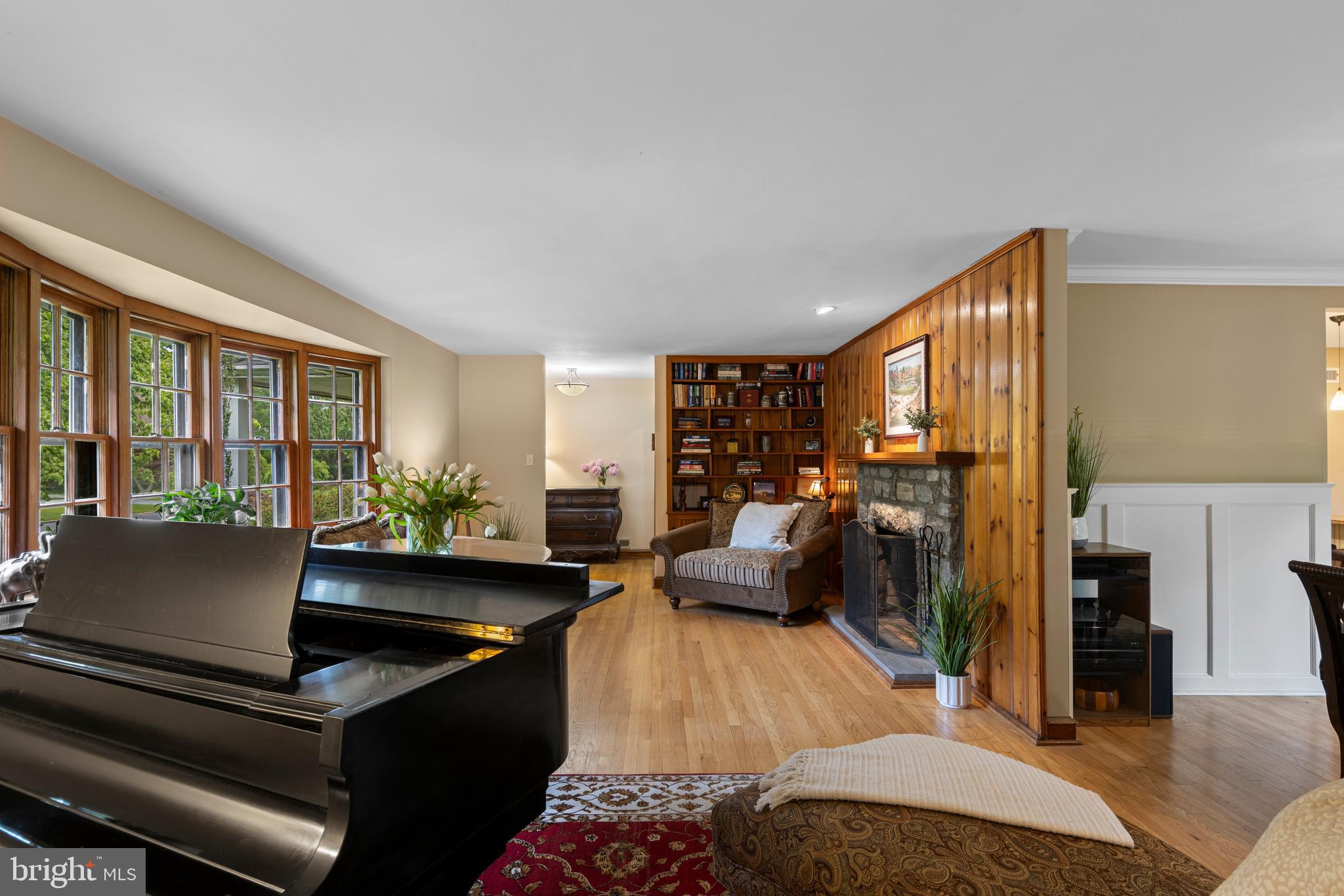 413 Hawthorne Road Wallingford, PA 19086 - Photo 15 of 52 a living room with furniture and large windows