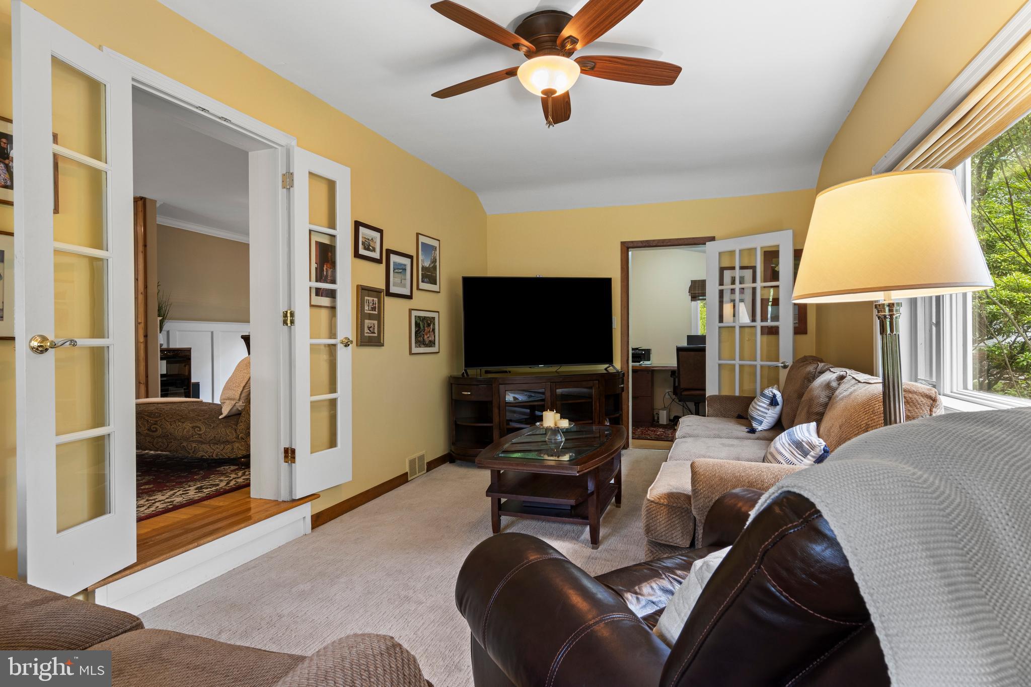 413 Hawthorne Road Wallingford, PA 19086 - Photo 16 of 52 a living room with furniture and a flat screen tv
