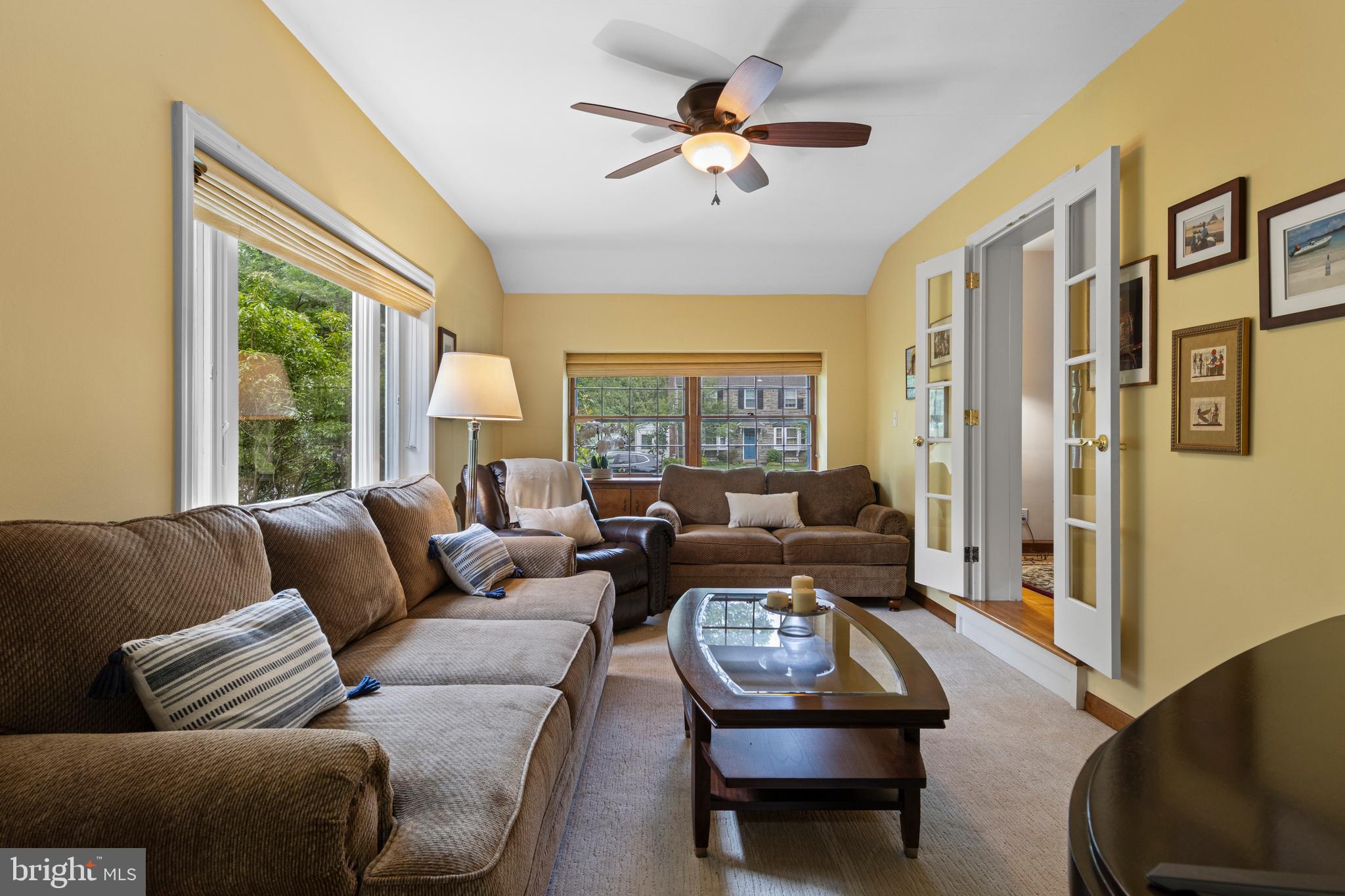 413 Hawthorne Road Wallingford, PA 19086 - Photo 17 of 52 a living room with furniture and a large window