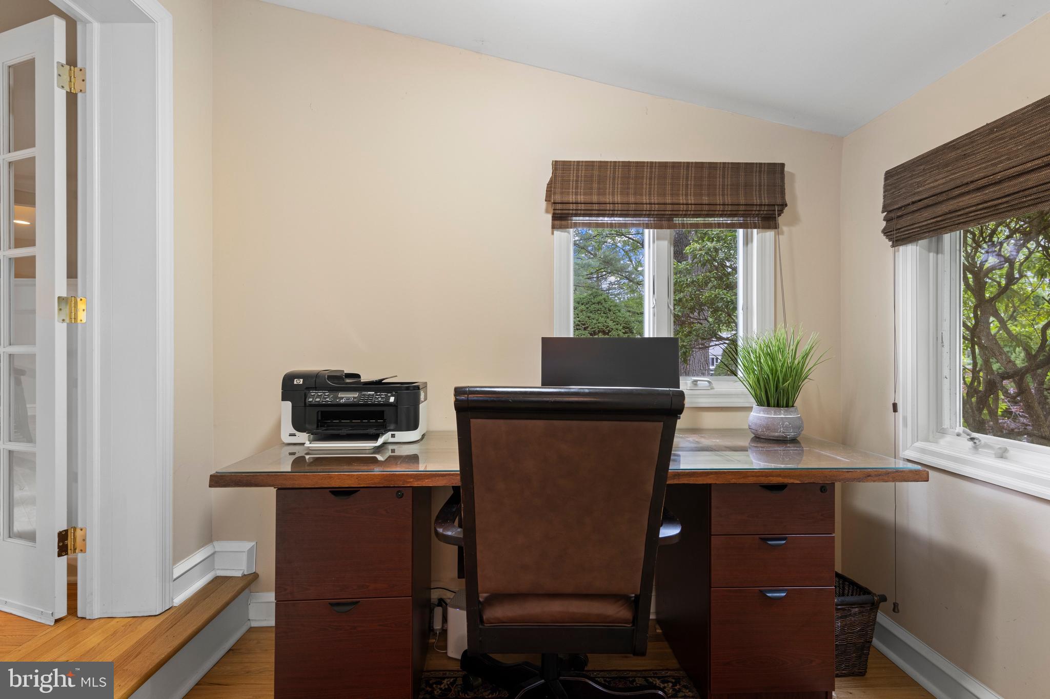 413 Hawthorne Road Wallingford, PA 19086 - Photo 18 of 52 a view of a workspace with furniture and a window