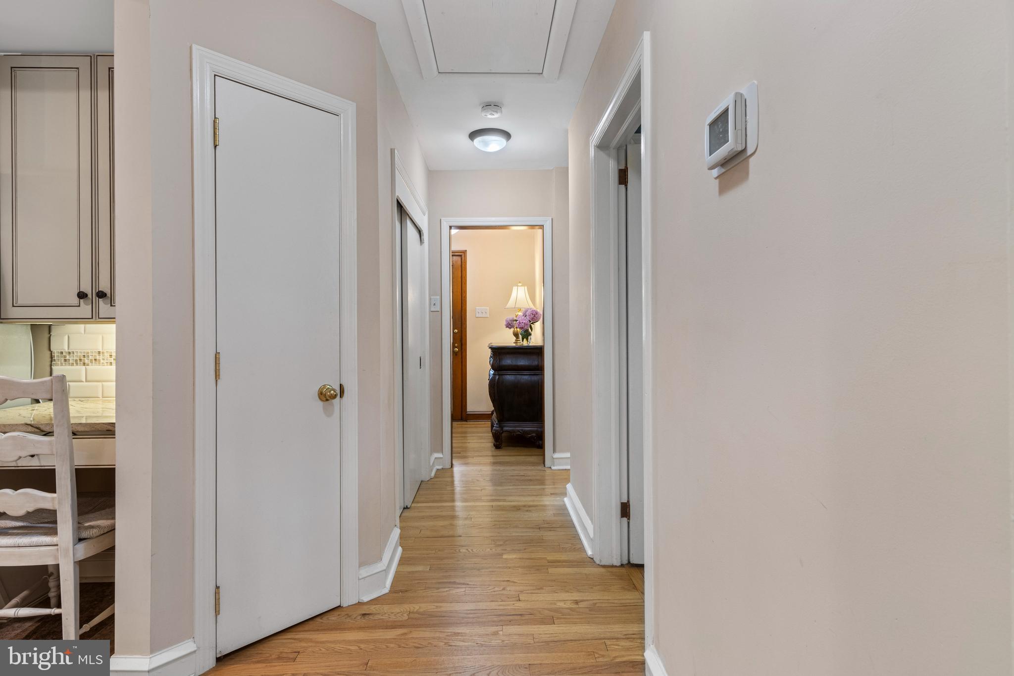 413 Hawthorne Road Wallingford, PA 19086 - Photo 27 of 52 a view of a hallway with wooden floor and closet