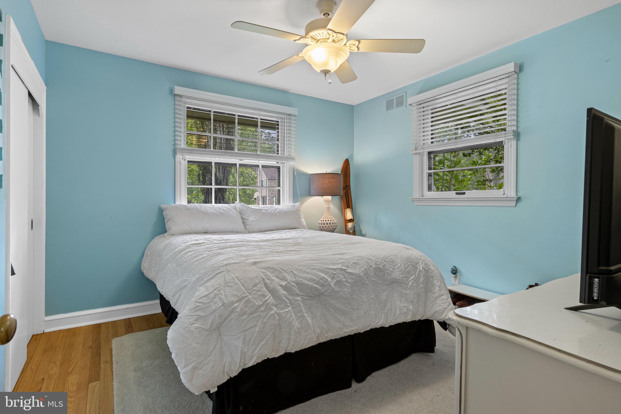 413 Hawthorne Road Wallingford, PA 19086 - Photo 32 of 52 a bedroom with a bed and a window