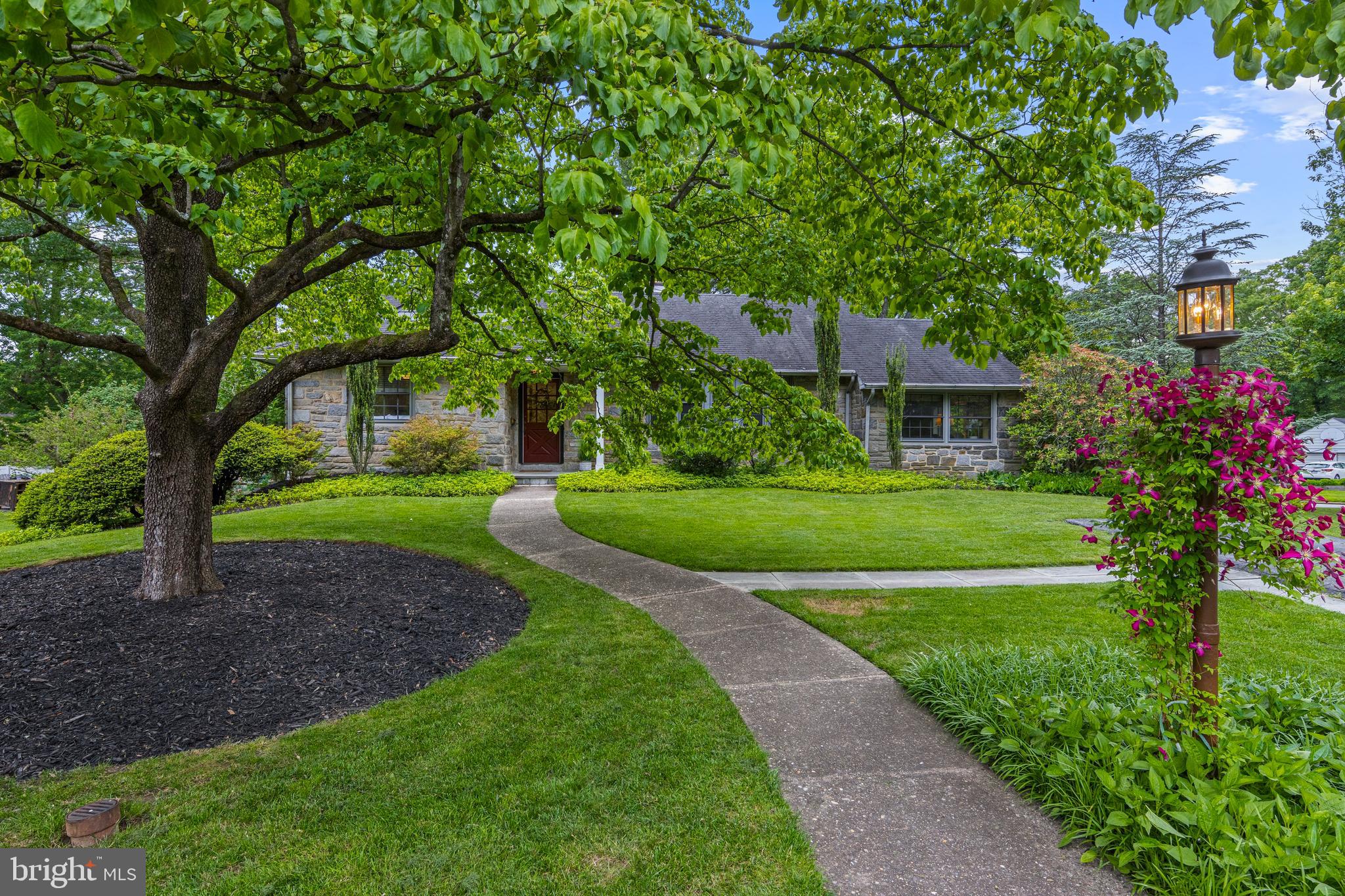 413 Hawthorne Road Wallingford, PA 19086 - Photo 44 of 52 a view of a house with a yard