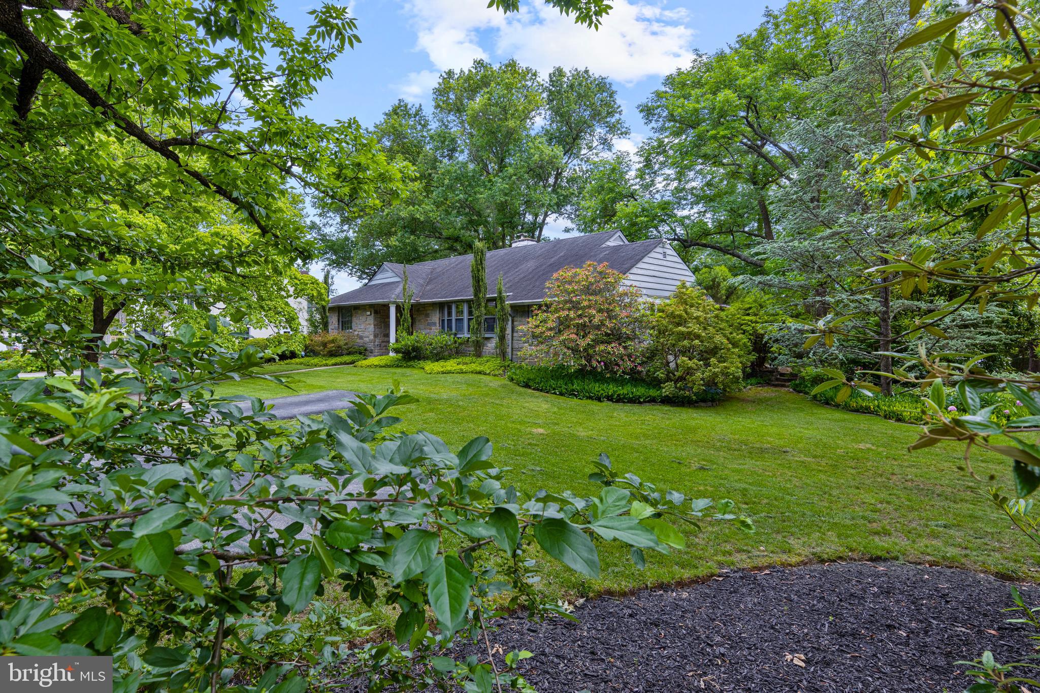 413 Hawthorne Road Wallingford, PA 19086 - Photo 48 of 52 a view of a house with a big yard