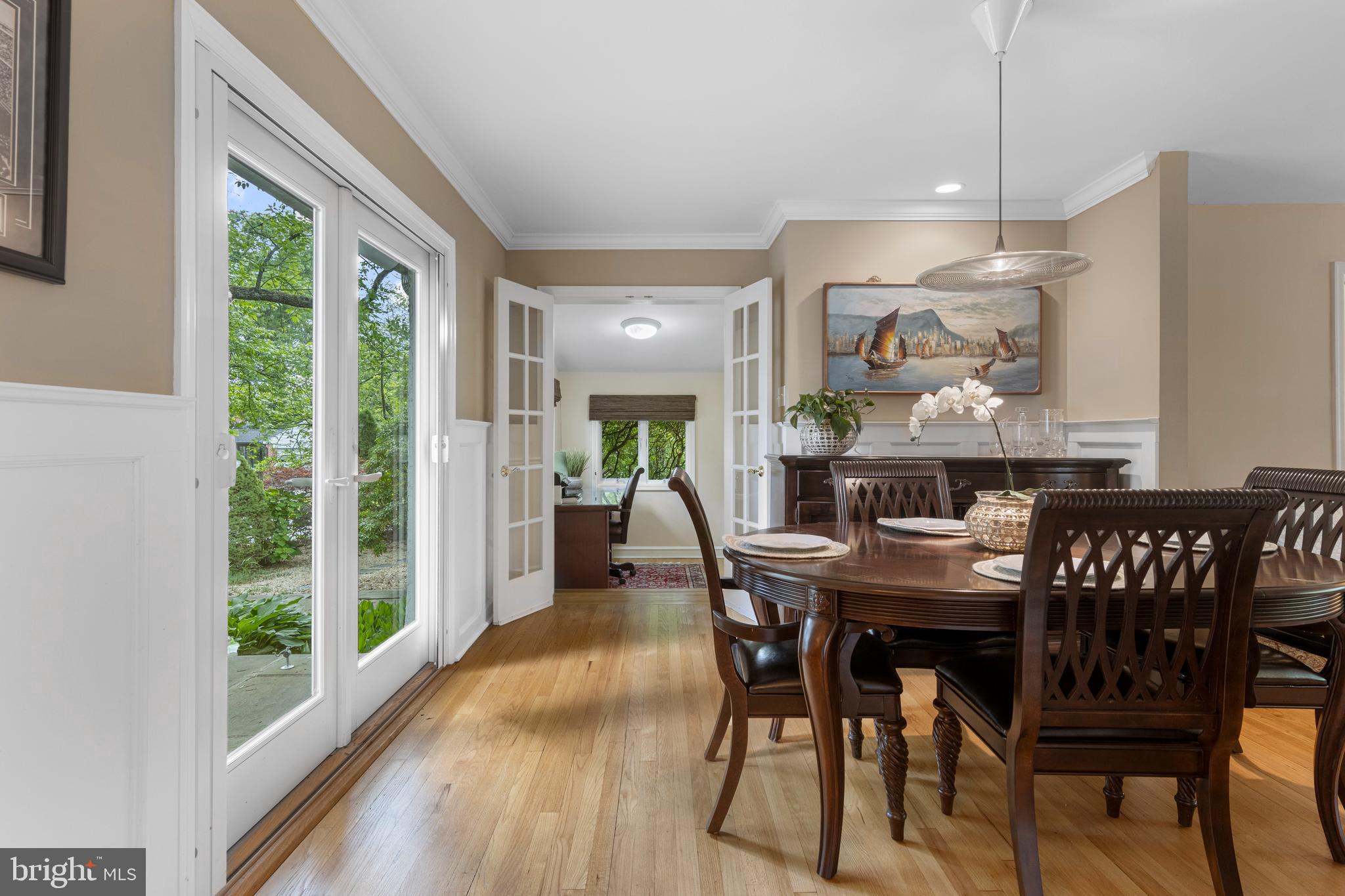 413 Hawthorne Road Wallingford, PA 19086 - Photo 9 of 52 a view of a dining room with furniture window and wooden floor