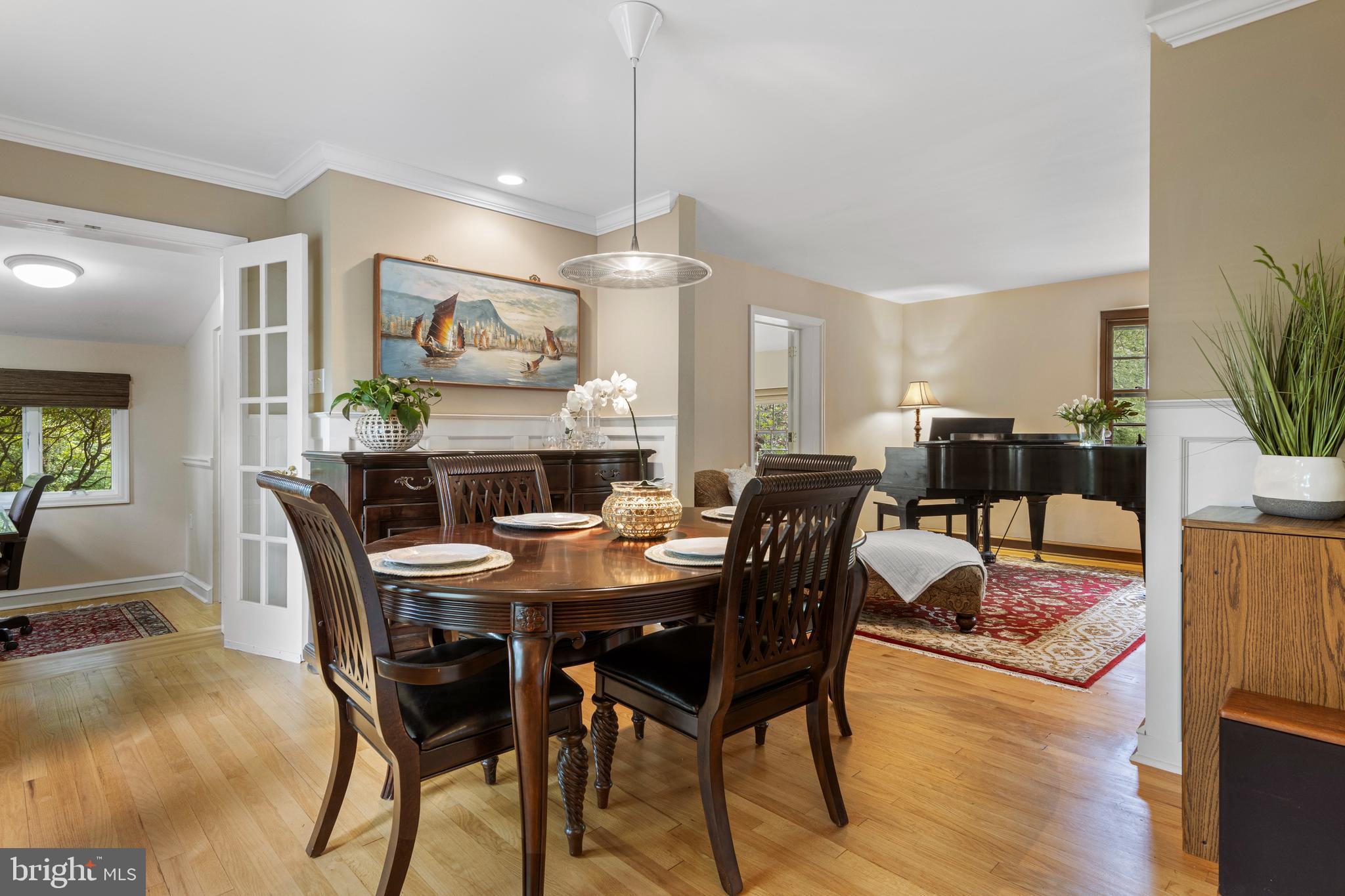413 Hawthorne Road Wallingford, PA 19086 - Photo 10 of 52 a view of a dining room with furniture window and wooden floor