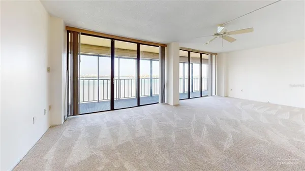 a dining room with large window