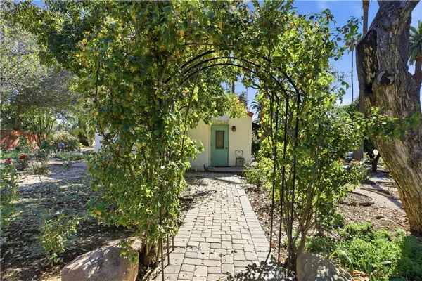 a living room with furniture fireplace and a flat screen tv