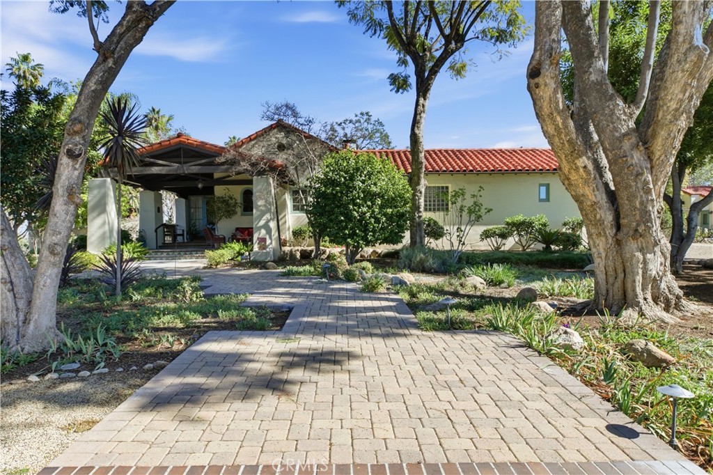 2855 McAllister Street Riverside, CA 92503 - Photo 2 of 75 a front view of a house with garden
