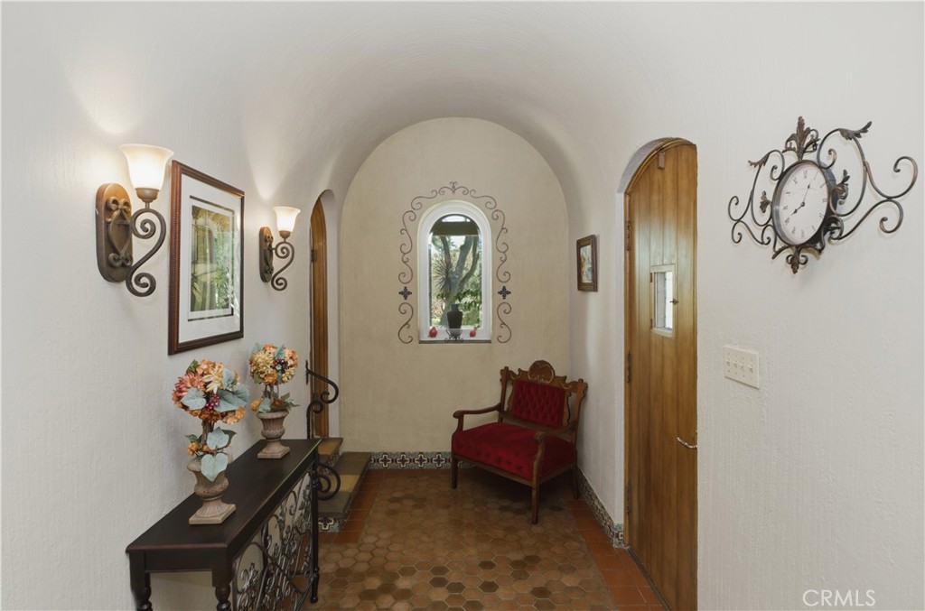 2855 McAllister Street Riverside, CA 92503 - Photo 23 of 75 a view of a hallway with entryway wooden floor and a table