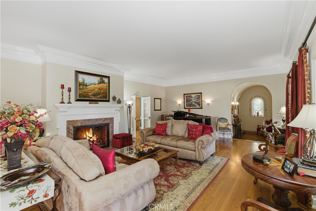 2855 McAllister Street Riverside, CA 92503 - Photo 26 of 75 a living room with furniture fireplace and a flat screen tv