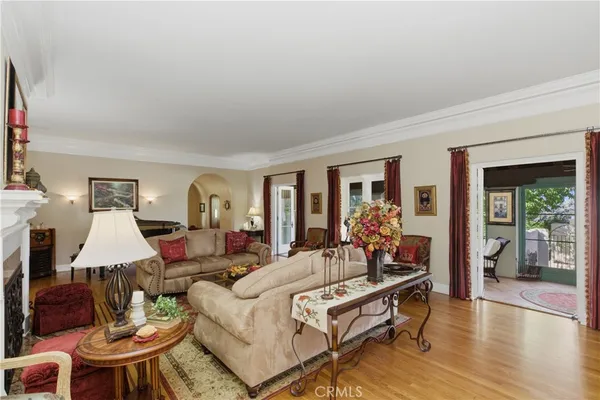 a view of a livingroom with furniture and a chandelier