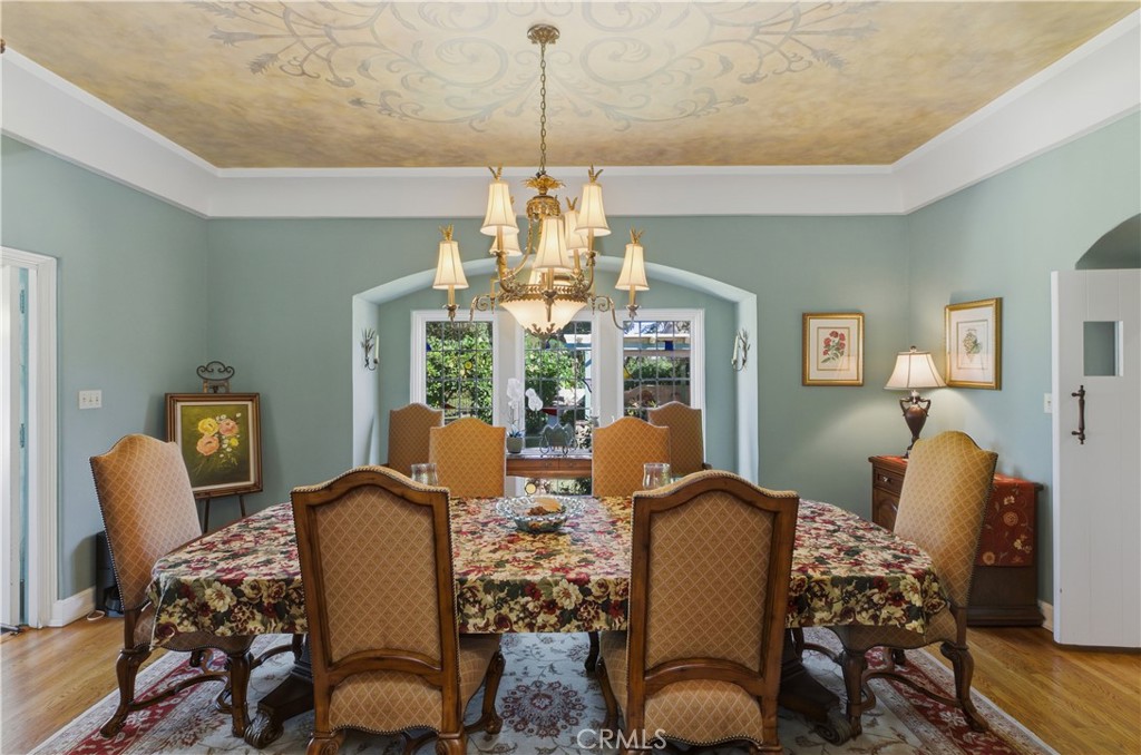 2855 McAllister Street Riverside, CA 92503 - Photo 35 of 75 a dining room with furniture a chandelier and window