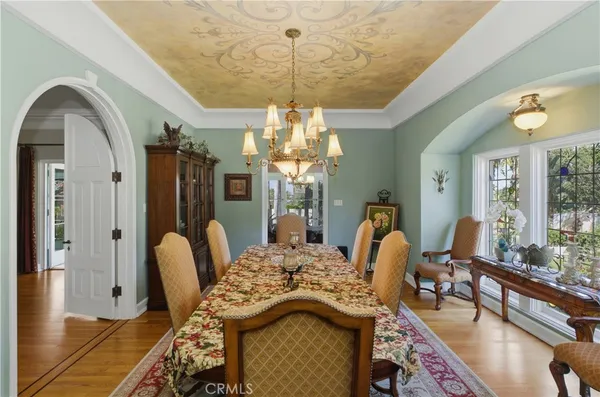 a view of a house with swimming pool and sitting area