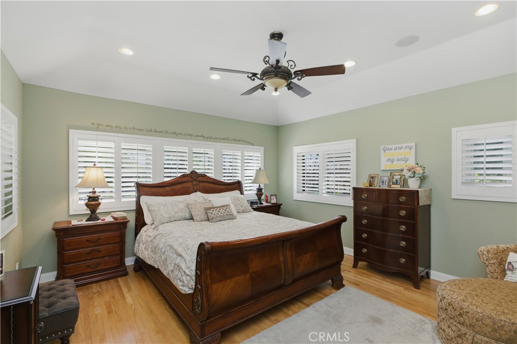 2855 McAllister Street Riverside, CA 92503 - Photo 44 of 75 a bedroom with a bed and wooden floor