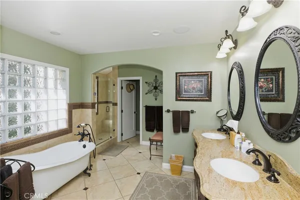 a view of room with furniture and wooden floor