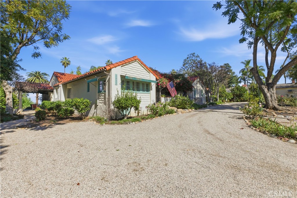 2855 McAllister Street Riverside, CA 92503 - Photo 5 of 75 a front view of a house with a yard