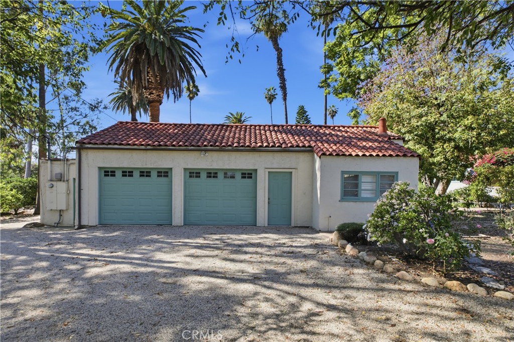2855 McAllister Street Riverside, CA 92503 - Photo 62 of 75 a front view of a house with a garden