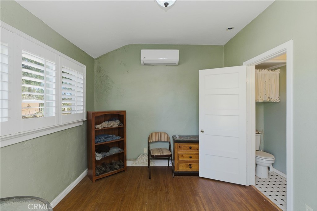 2855 McAllister Street Riverside, CA 92503 - Photo 64 of 75 a view of room with furniture and wooden floor