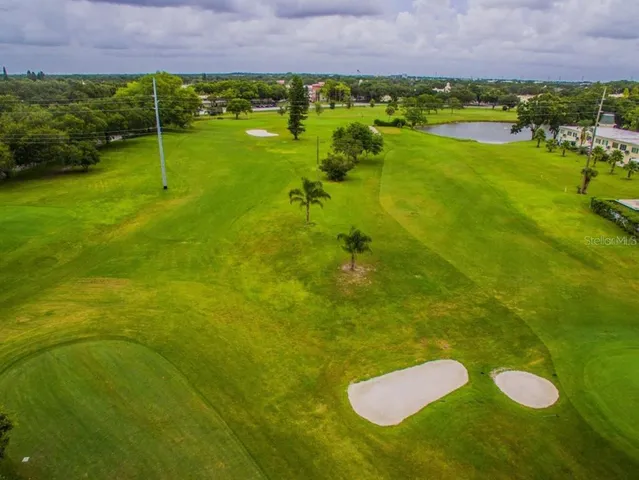 a view of a garden with an ocean